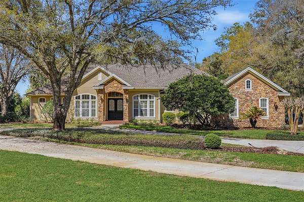 1.78 Acres of Land with Home for Sale in Newberry, Florida