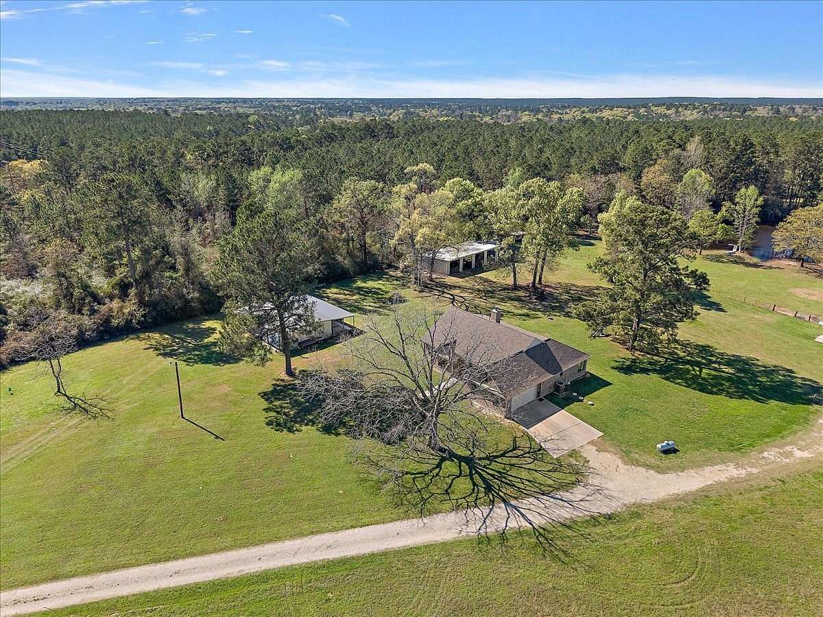 49.2 Acres of Recreational Land with Home for Sale in Trinity, Texas