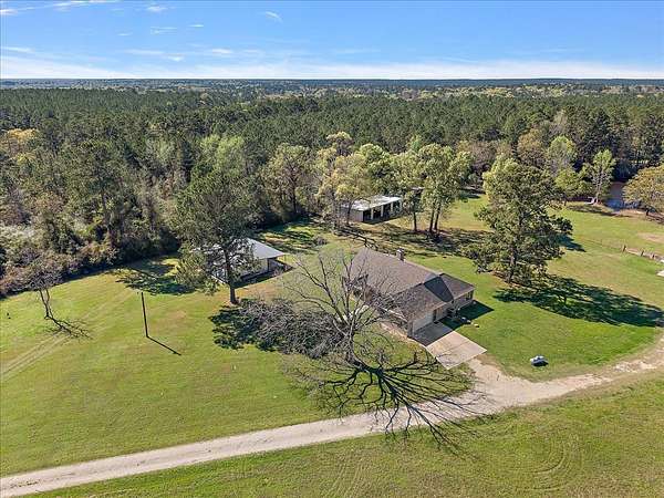 49.2 Acres of Recreational Land with Home for Sale in Trinity, Texas