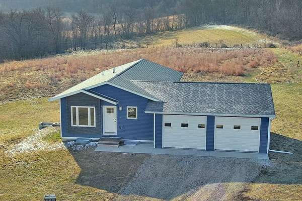 3 Acres of Land with Home for Sale in Dorchester, Iowa