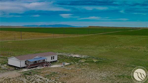 40 Acres of Agricultural Land with Home for Sale in Lavina, Montana