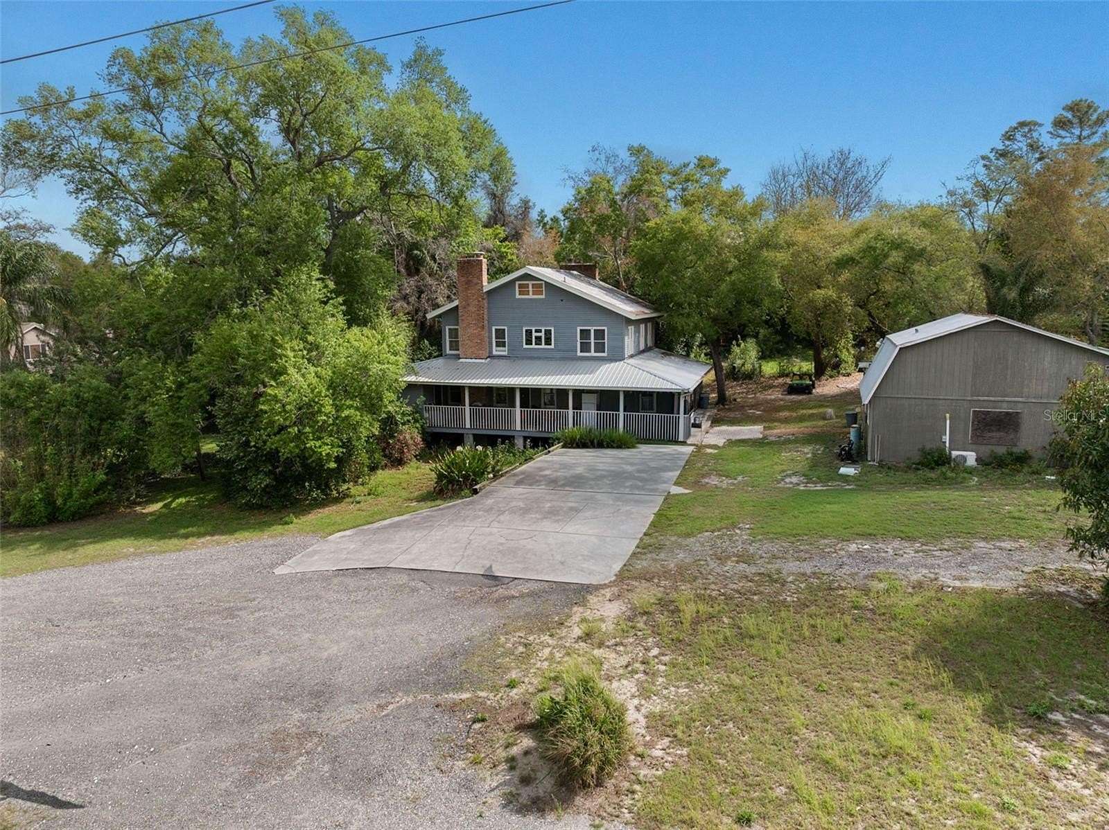 3.13 Acres of Land with Home for Sale in Palm Harbor, Florida