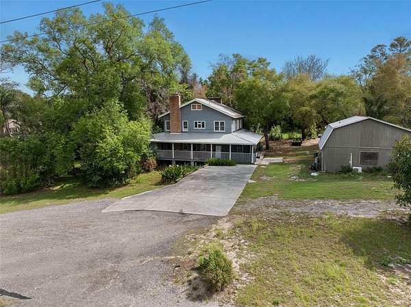 3.13 Acres of Land with Home for Sale in Palm Harbor, Florida