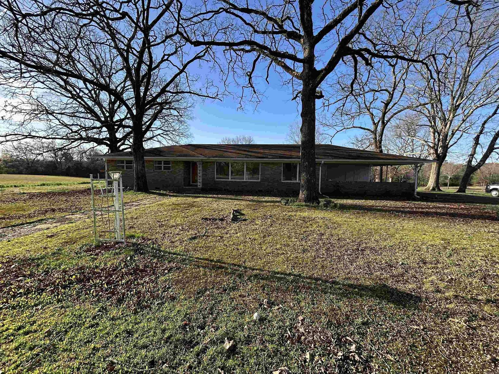 5.66 Acres of Land with Home for Sale in Mena, Arkansas