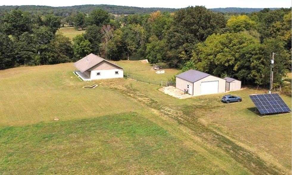 4 Acres of Land with Home for Sale in Siloam Springs, Arkansas