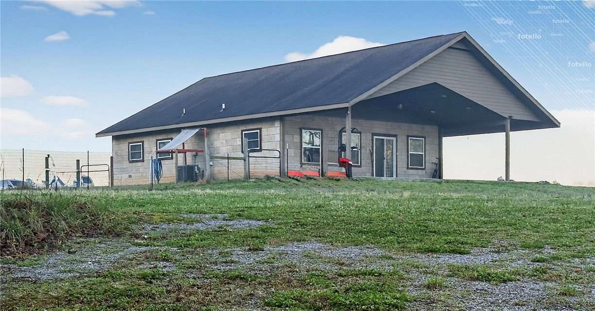 4 Acres of Land with Home for Sale in Siloam Springs, Arkansas