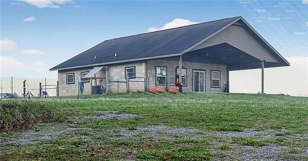 4 Acres of Land with Home for Sale in Siloam Springs, Arkansas