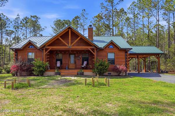 10.9 Acres of Land with Home for Sale in Glen St. Mary, Florida