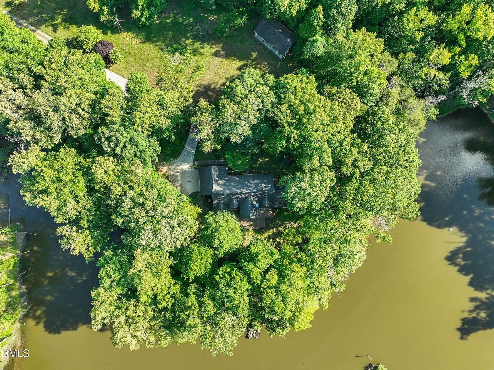 36.1 Acres of Land with Home for Sale in Snow Camp, North Carolina