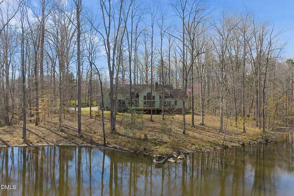 36.1 Acres of Land with Home for Sale in Snow Camp, North Carolina
