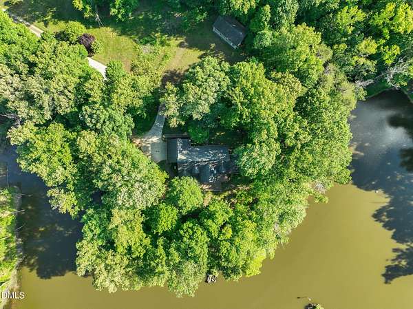 36.1 Acres of Land with Home for Sale in Snow Camp, North Carolina