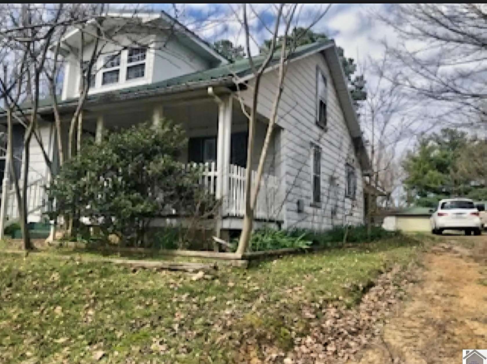 5.5 Acres of Land with Home for Sale in Mayfield, Kentucky