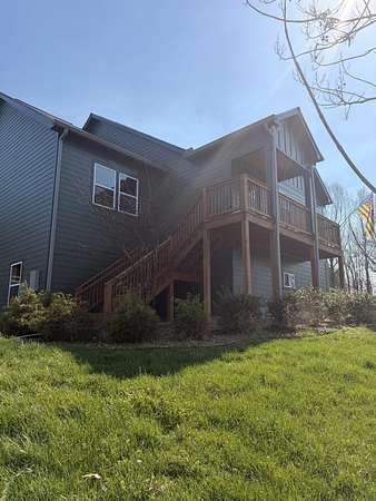 1.83 Acres of Land with Home for Sale in Burns, Tennessee