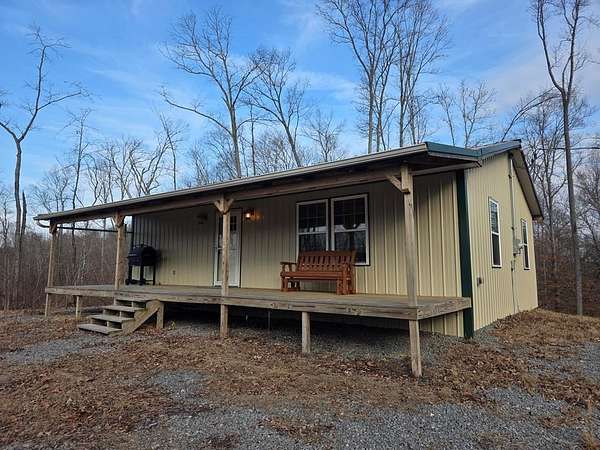 17.4 Acres of Land with Home for Sale in Gainesboro, Tennessee