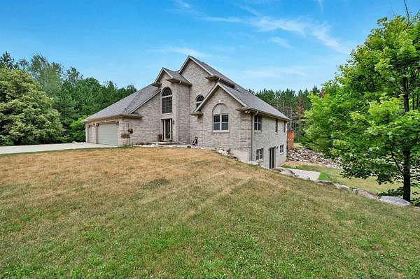 12 Acres of Recreational Land with Home for Sale in Lena, Wisconsin