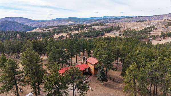 9.67 Acres of Land with Home for Sale in Bellvue, Colorado