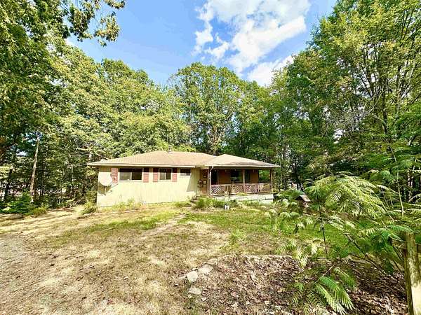 1.5 Acres of Land with Home for Sale in Selmer, Tennessee