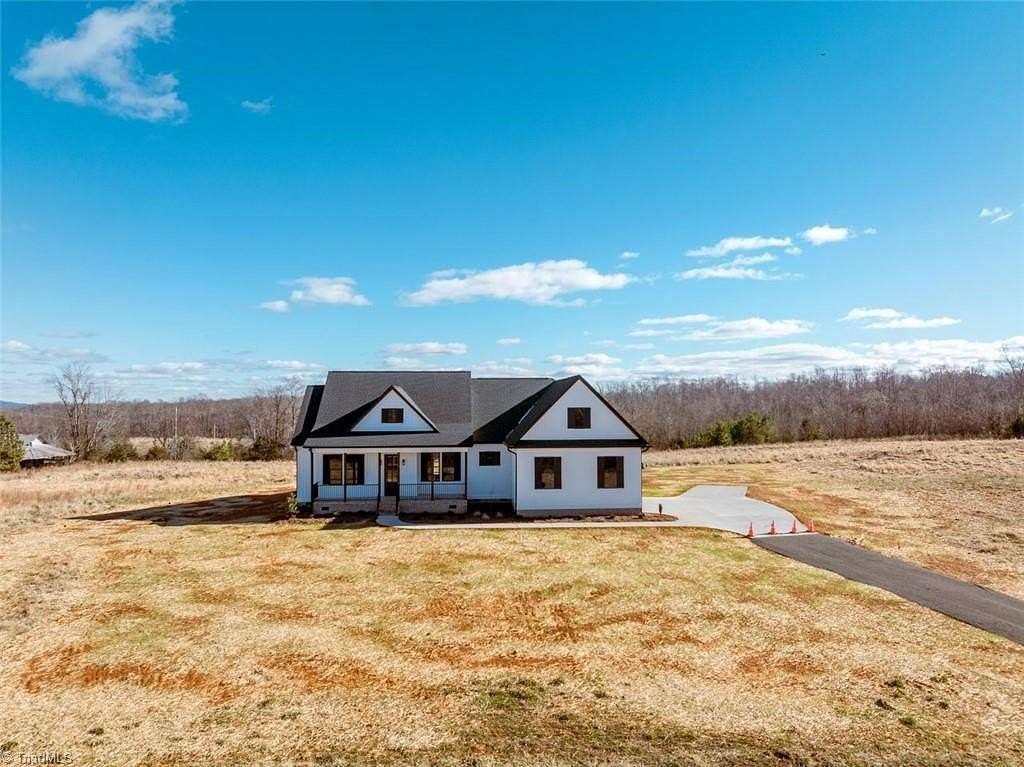 5 Acres of Land with Home for Sale in Sandy Ridge, North Carolina