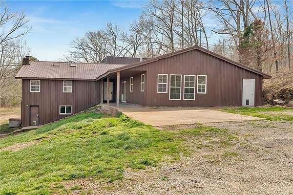 18.2 Acres of Land with Home for Sale in Elkins, Arkansas