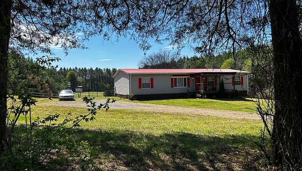 1.57 Acres of Land with Home for Sale in Etowah, Tennessee