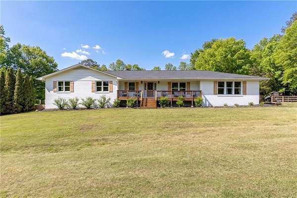 8.14 Acres of Land with Home for Sale in Cumming, Georgia