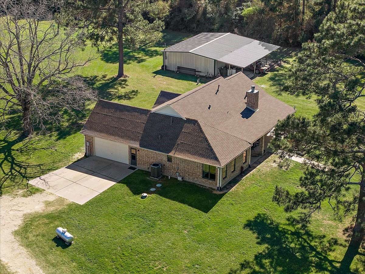 10 Acres of Land with Home for Sale in Trinity, Texas