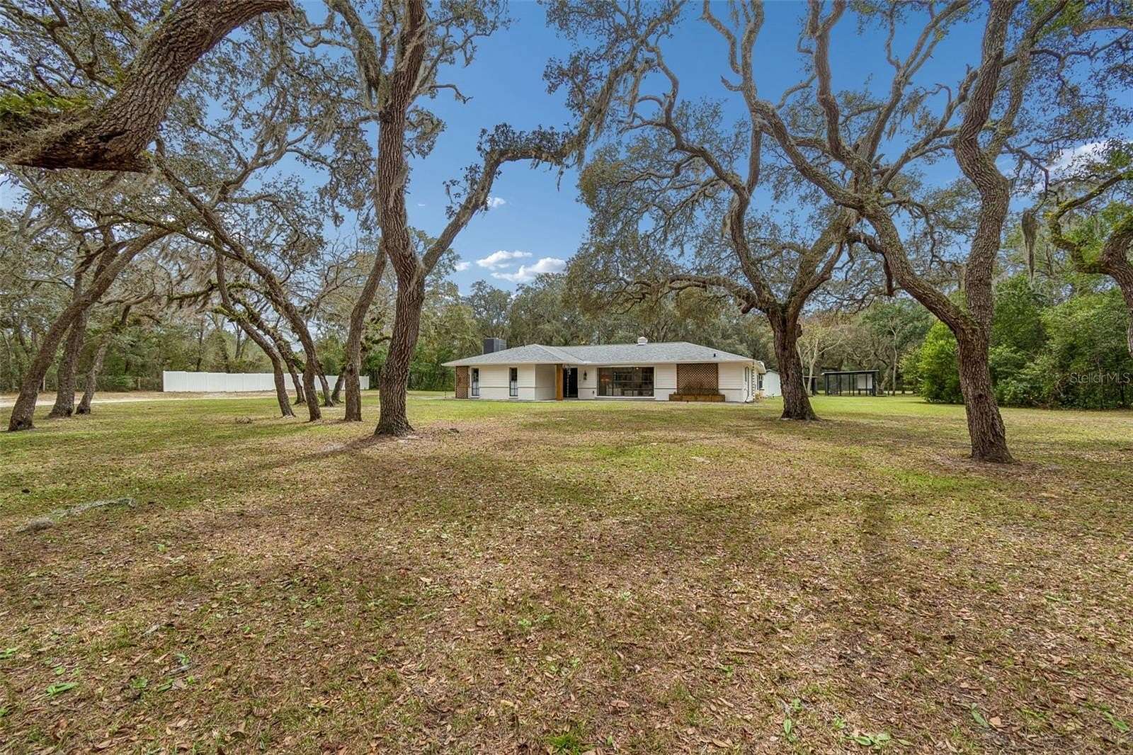 3.89 Acres of Land with Home for Sale in Spring Hill, Florida