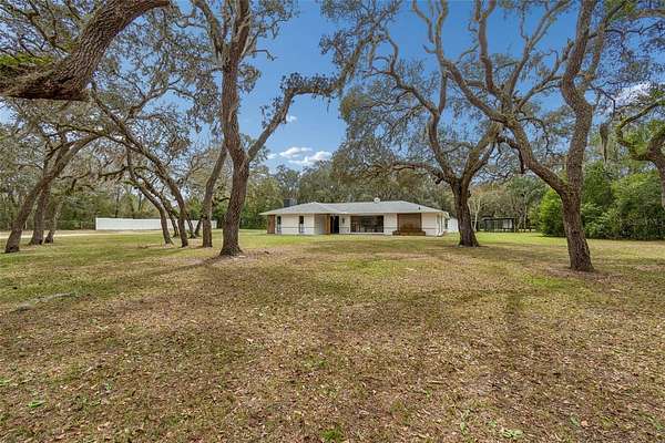 3.89 Acres of Land with Home for Sale in Spring Hill, Florida