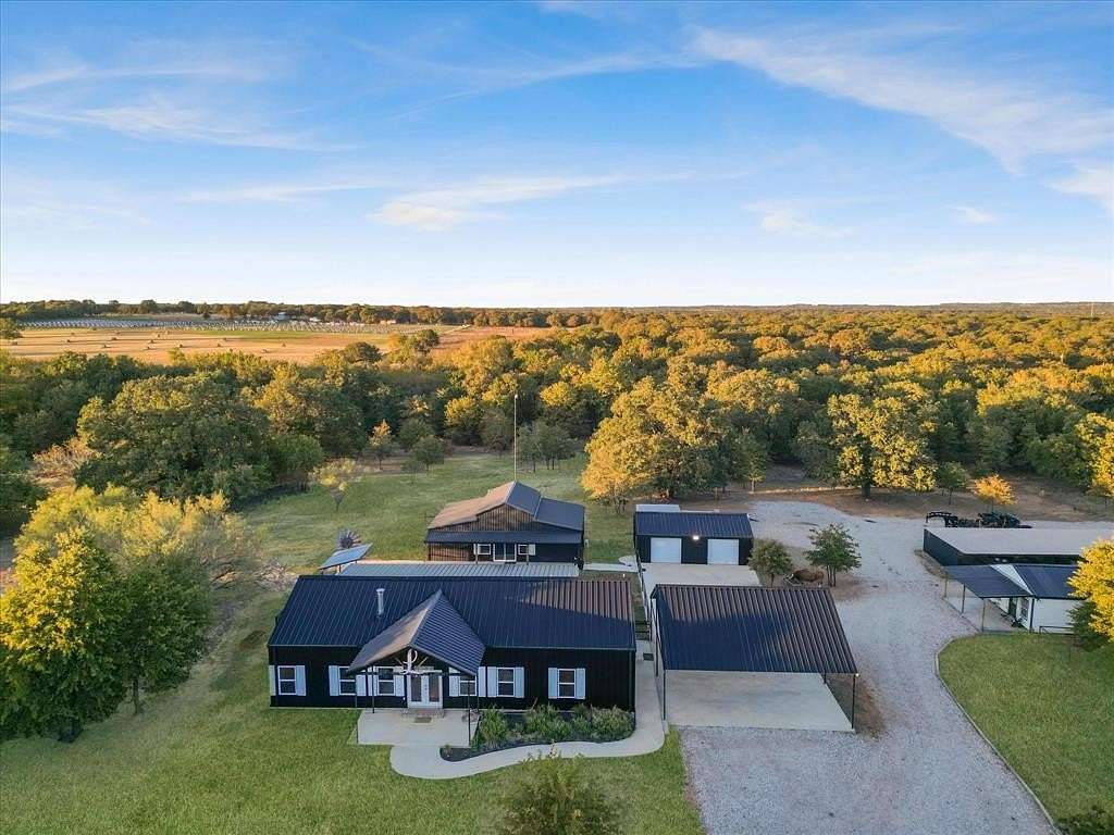 80.6 Acres of Recreational Land with Home for Sale in Poolville, Texas