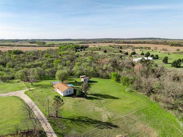 12 Acres of Land with Home for Sale in Grandview, Texas
