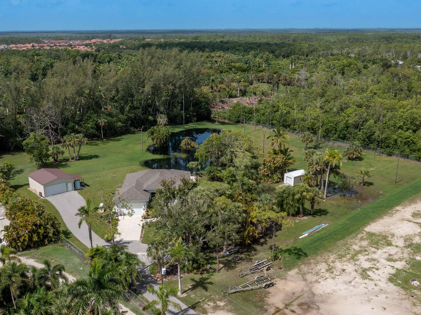 2.49 Acres of Land with Home for Sale in Naples, Florida
