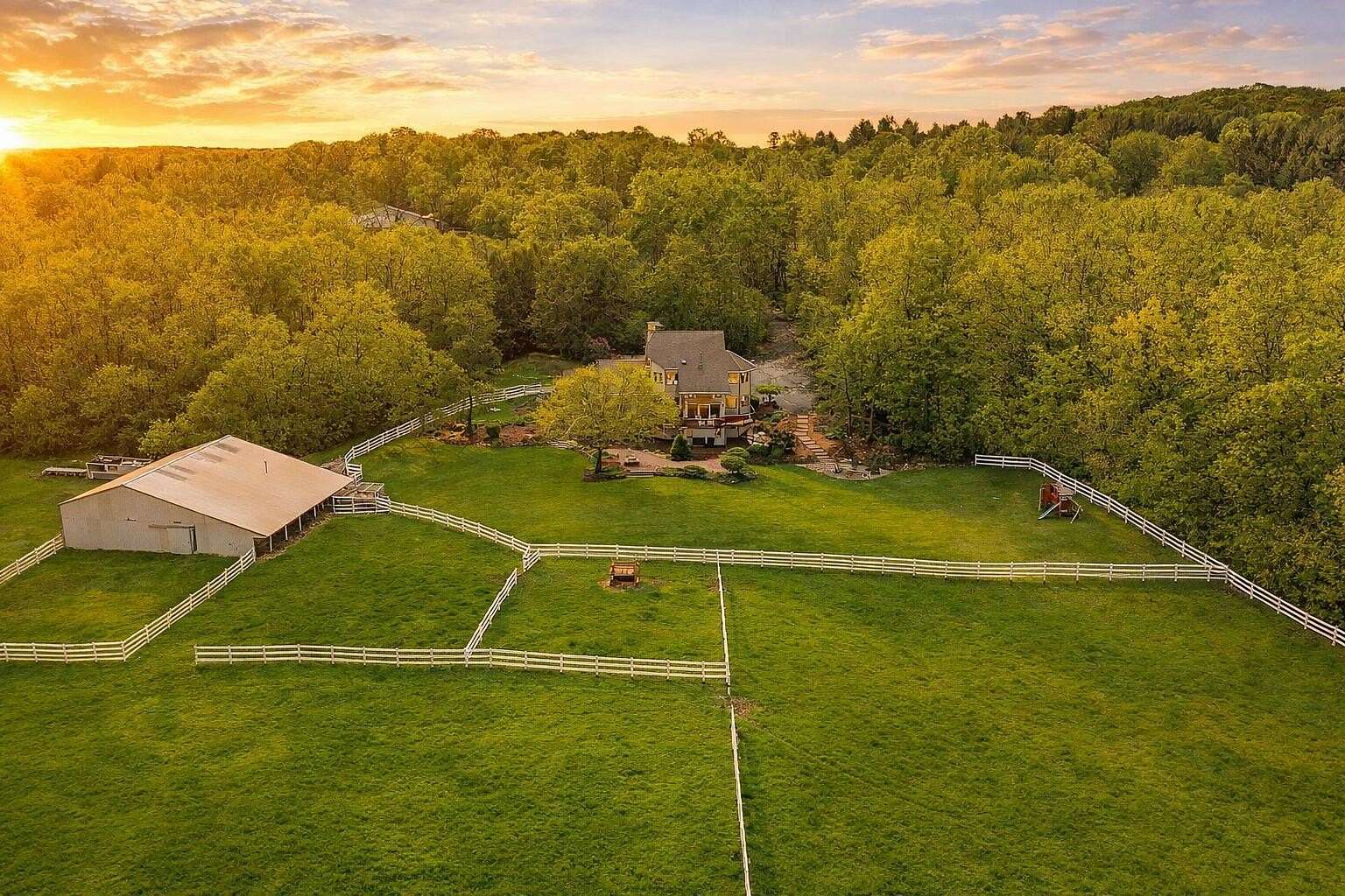 57.3 Acres of Agricultural Land with Home for Sale in Hartford, Wisconsin