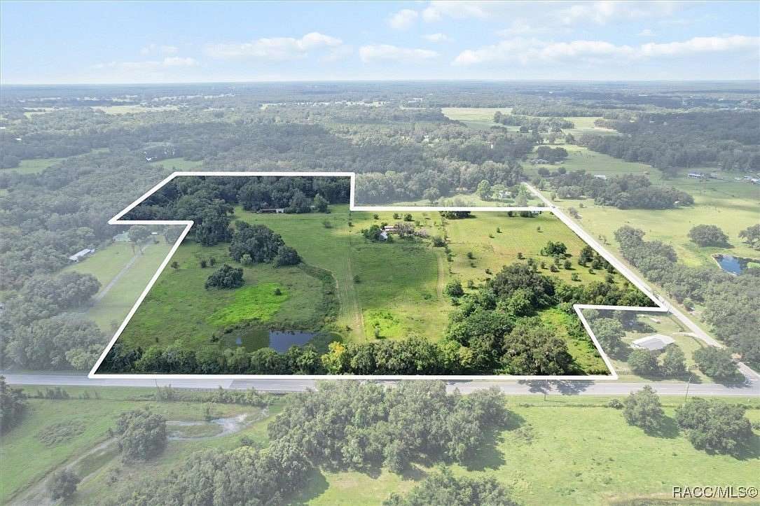 29.9 Acres of Land with Home for Sale in Bushnell, Florida