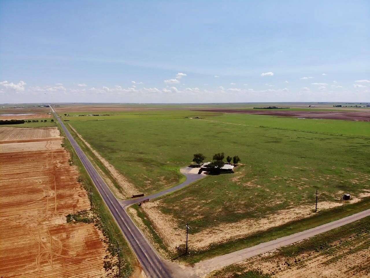 156 Acres of Agricultural Land with Home for Sale in Wolfforth, Texas