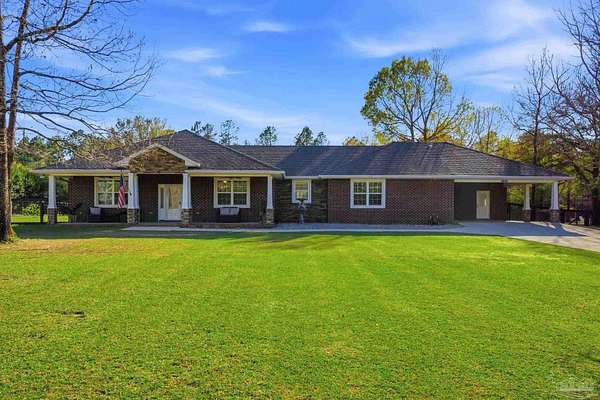 1.6 Acres of Land with Home for Sale in Pace, Florida