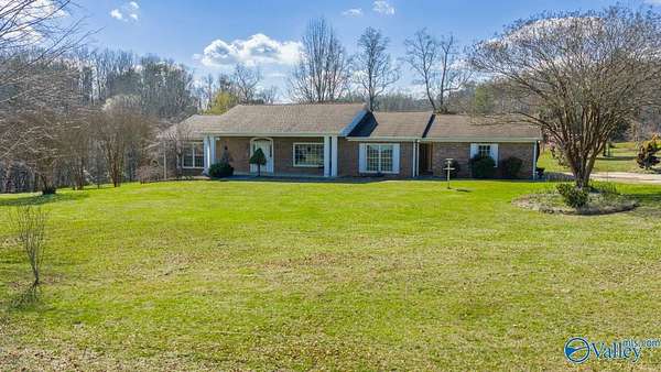 57 Acres of Land with Home for Auction in Athens, Tennessee