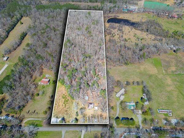 10 Acres of Land with Home for Sale in Bryant, Alabama