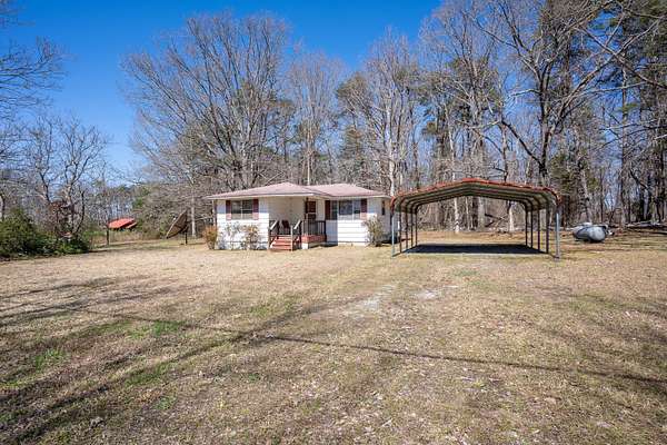 10 Acres of Land with Home for Sale in Bryant, Alabama