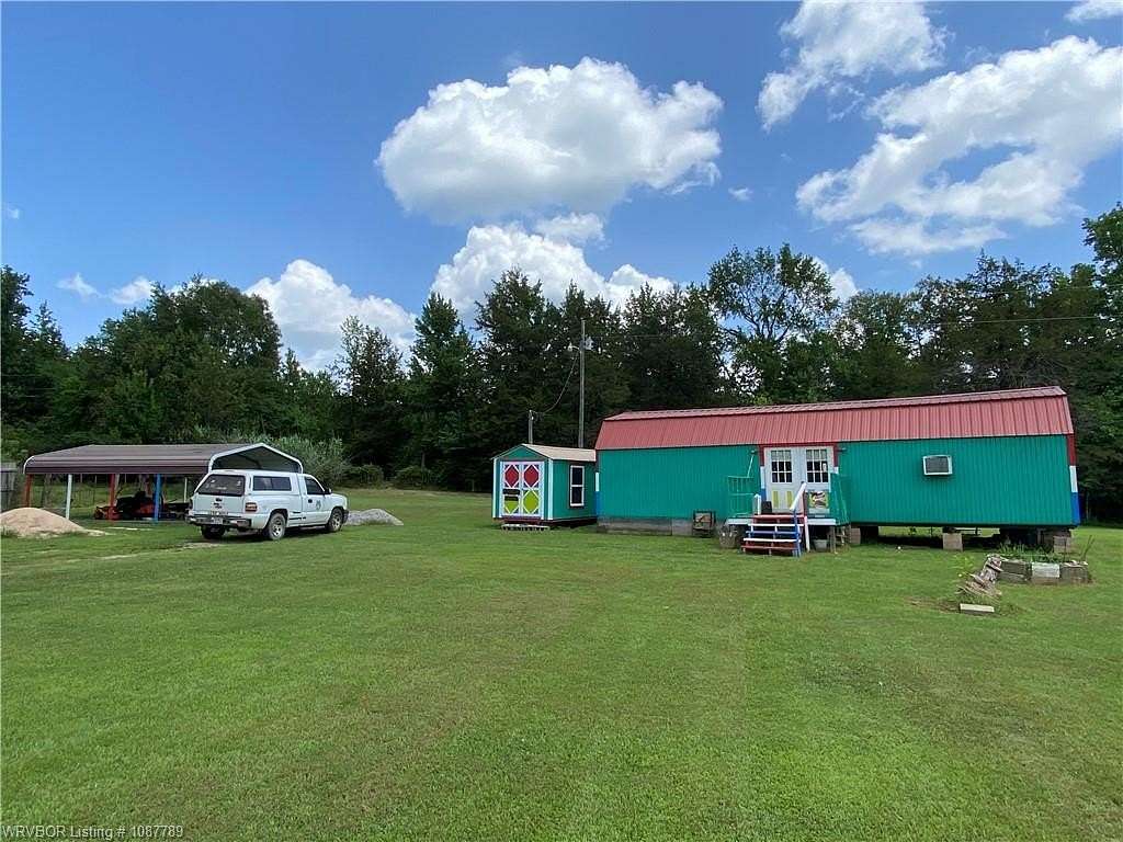 0.9 Acres of Land with Home for Sale in Mulberry, Arkansas