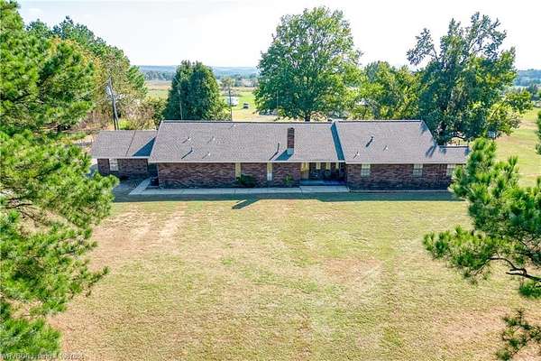 10.4 Acres of Land with Home for Auction in Charleston, Arkansas