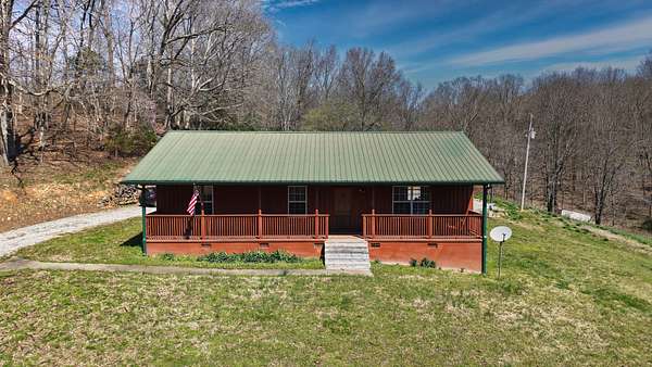 5.68 Acres of Land with Home for Sale in Vanleer, Tennessee