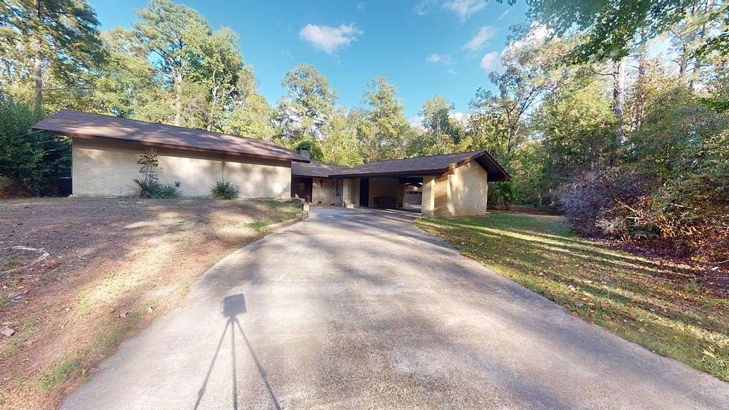 14 Acres of Land with Home for Sale in Bon Wier, Texas