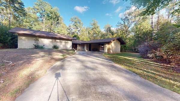 14 Acres of Land with Home for Sale in Bon Wier, Texas