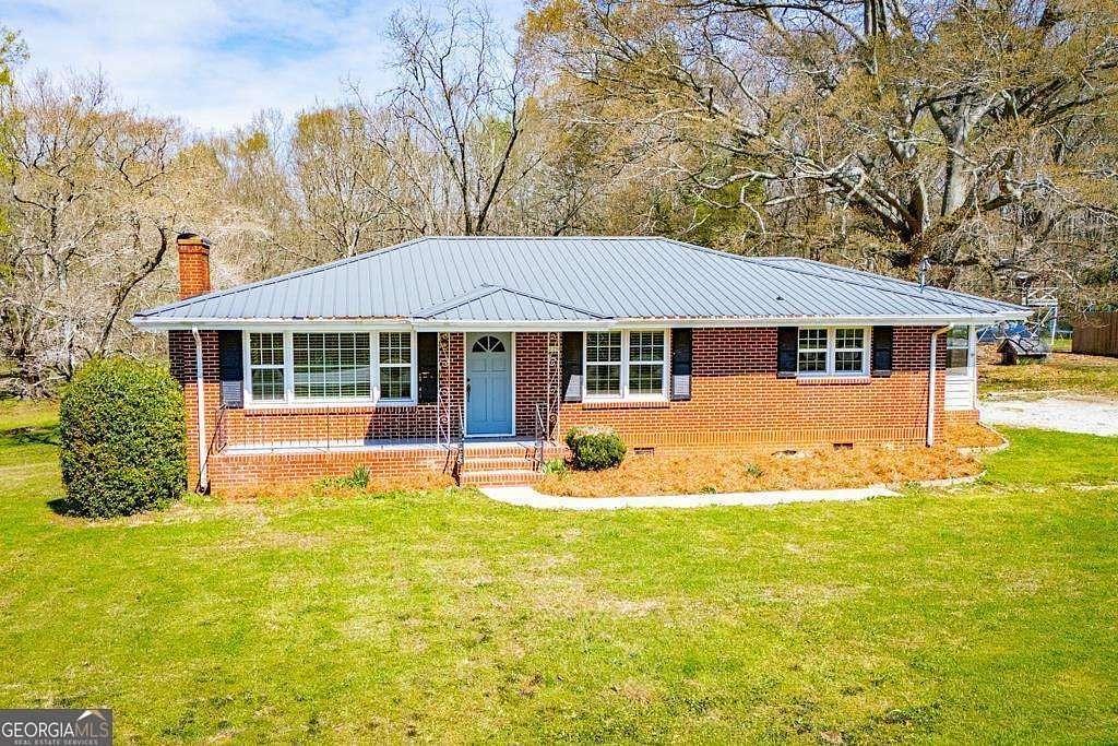 2.85 Acres of Land with Home for Sale in Bowdon, Georgia
