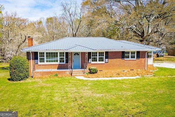 2.85 Acres of Land with Home for Sale in Bowdon, Georgia