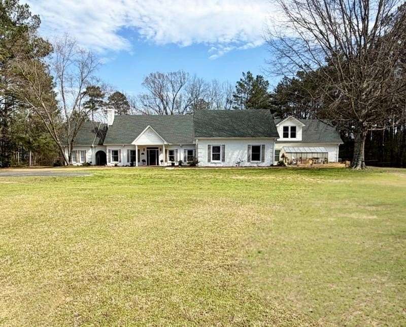 7.73 Acres of Land with Home for Sale in Tupelo, Mississippi