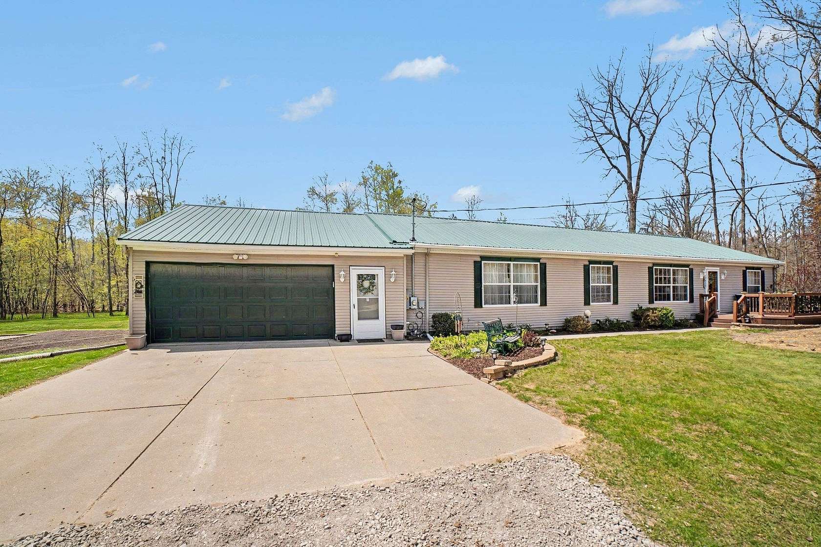 1.5 Acres of Land with Home for Sale in Beaverton, Michigan