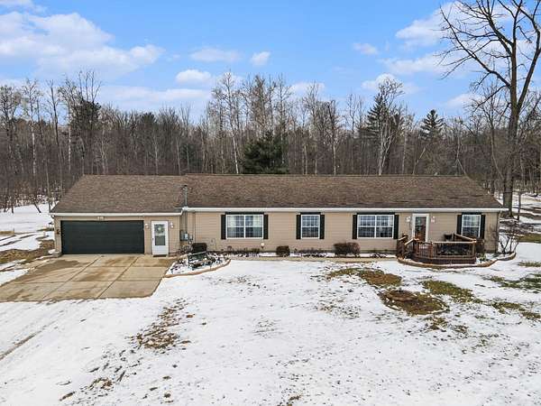 1.5 Acres of Land with Home for Sale in Beaverton, Michigan