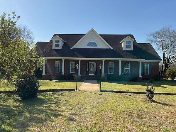 85 Acres of Land with Home for Sale in Forest Home, Alabama