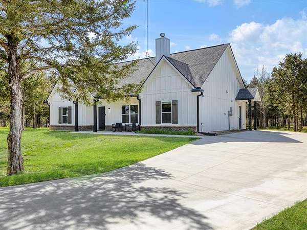 5 Acres of Land with Home for Sale in Wolfe City, Texas